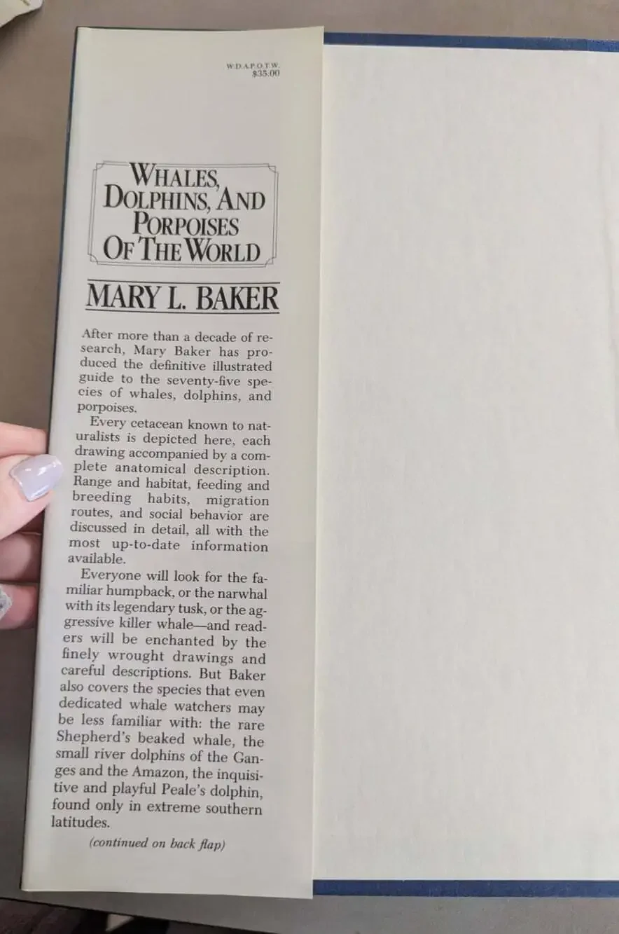 Whales, Dolphins, and Porpoises of the World by Mary L. Baker Hardcover Book